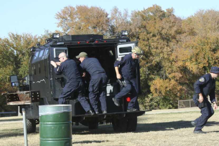 Officers from the North Texas Metro SWAT team participate in a training exercise at...