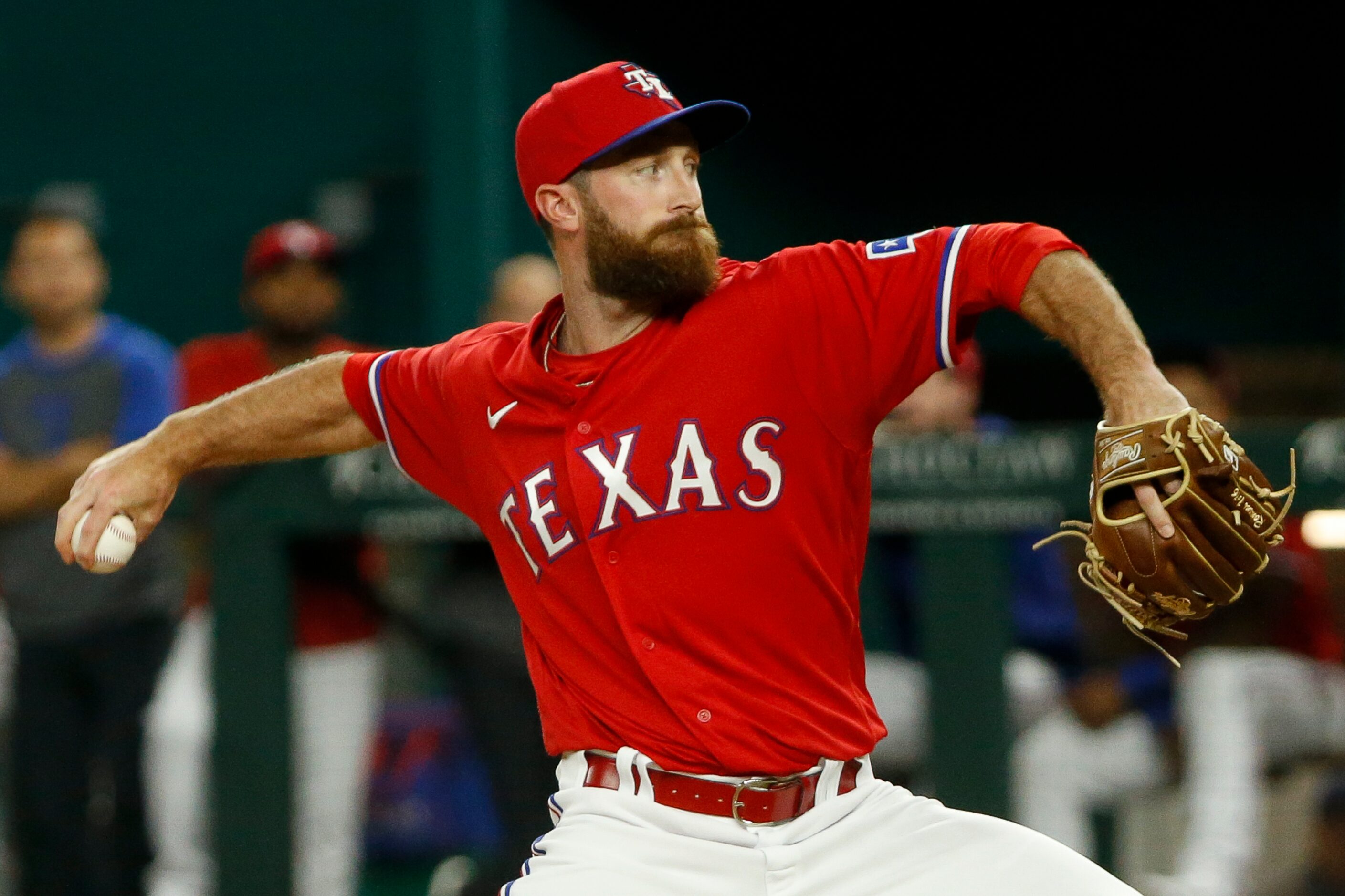 Texas Rangers relief pitcher Spencer Patton (61) delivers a pitch during the ninth inning...