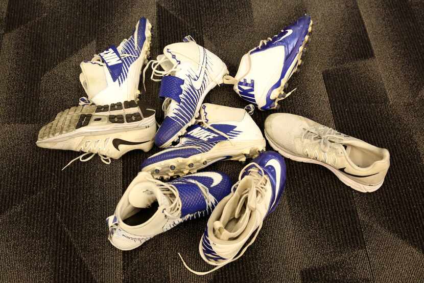 A pile of cleats inside the Dallas Cowboys' locker room at The Star in Frisco, Texas on Jan....