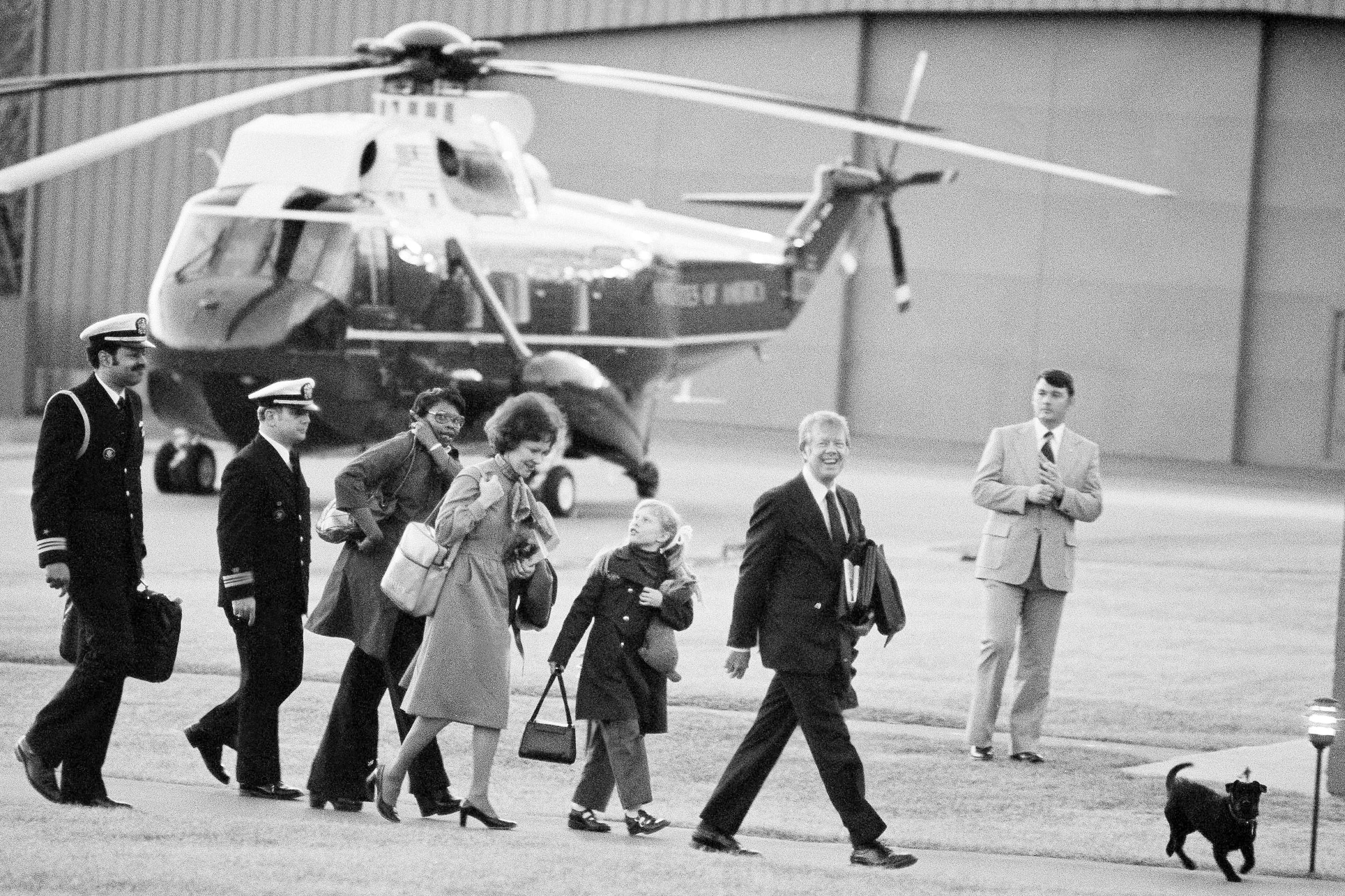 President Jimmy Carter, second from right, arrives at Camp David, Md., with first lady...