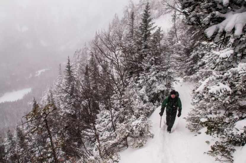 
Lead snow ranger Chris Joosen navigates the Lion’s Head trail along Mount Washington.
