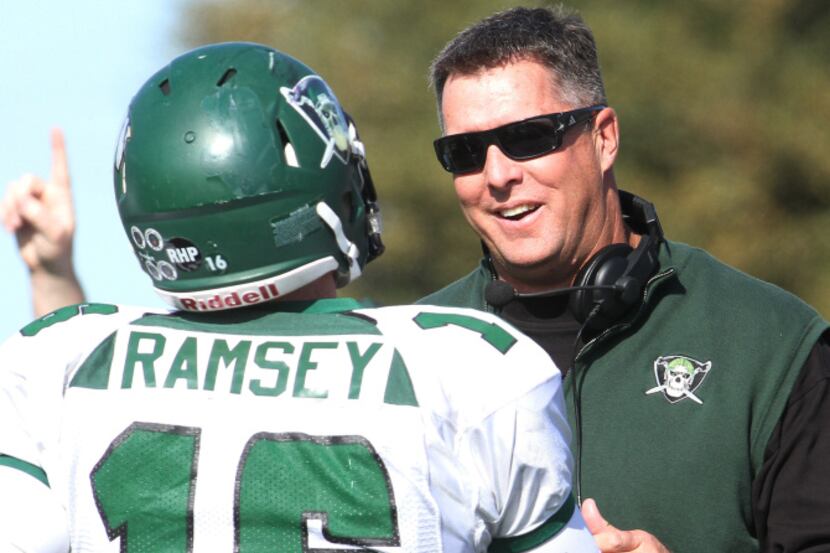 Mesquite Poteet head coach Randy Jackson was happy with his quarterback Tanner Ramsey (16)...