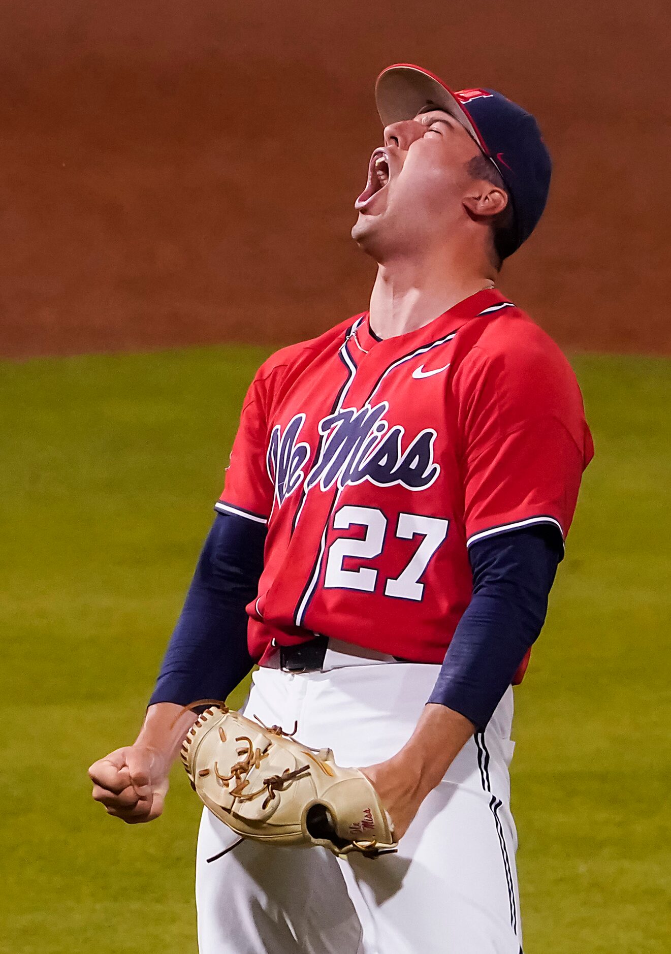 Mississippi pitcher Taylor Broadway celebrates after recording the final out of a 3-1...