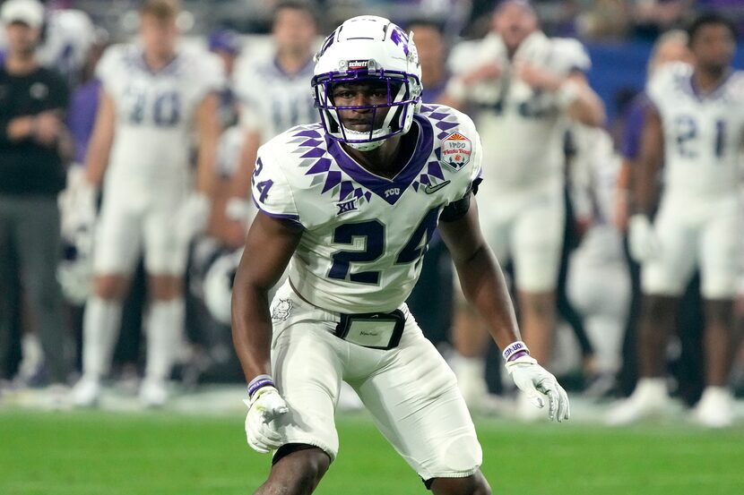 FILE - TCU cornerback Josh Newton lines up against Michigan during the second half of the...