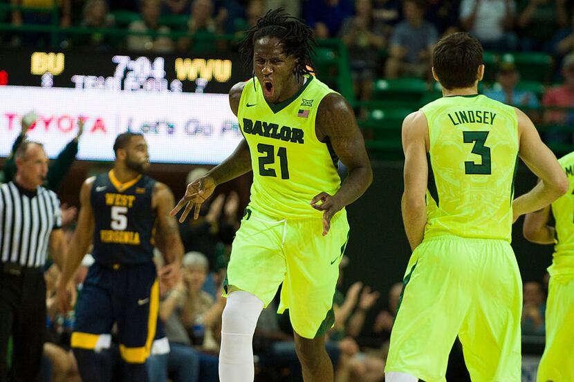 WACO, TX - MARCH 5: Taurean Prince #21 of the Baylor Bears celebrates after a made...