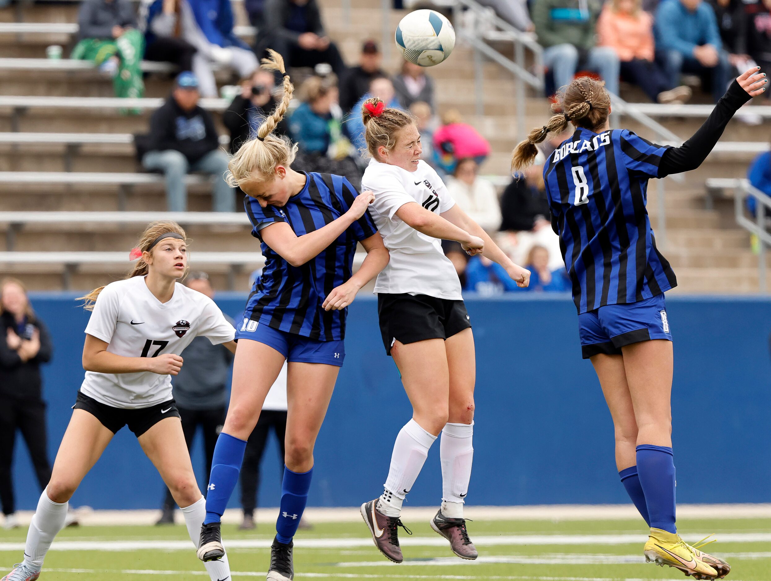 Flower Mound Marcus midfielder Allie Williams (10) and Trophy Club Byron Nelson midfielder...