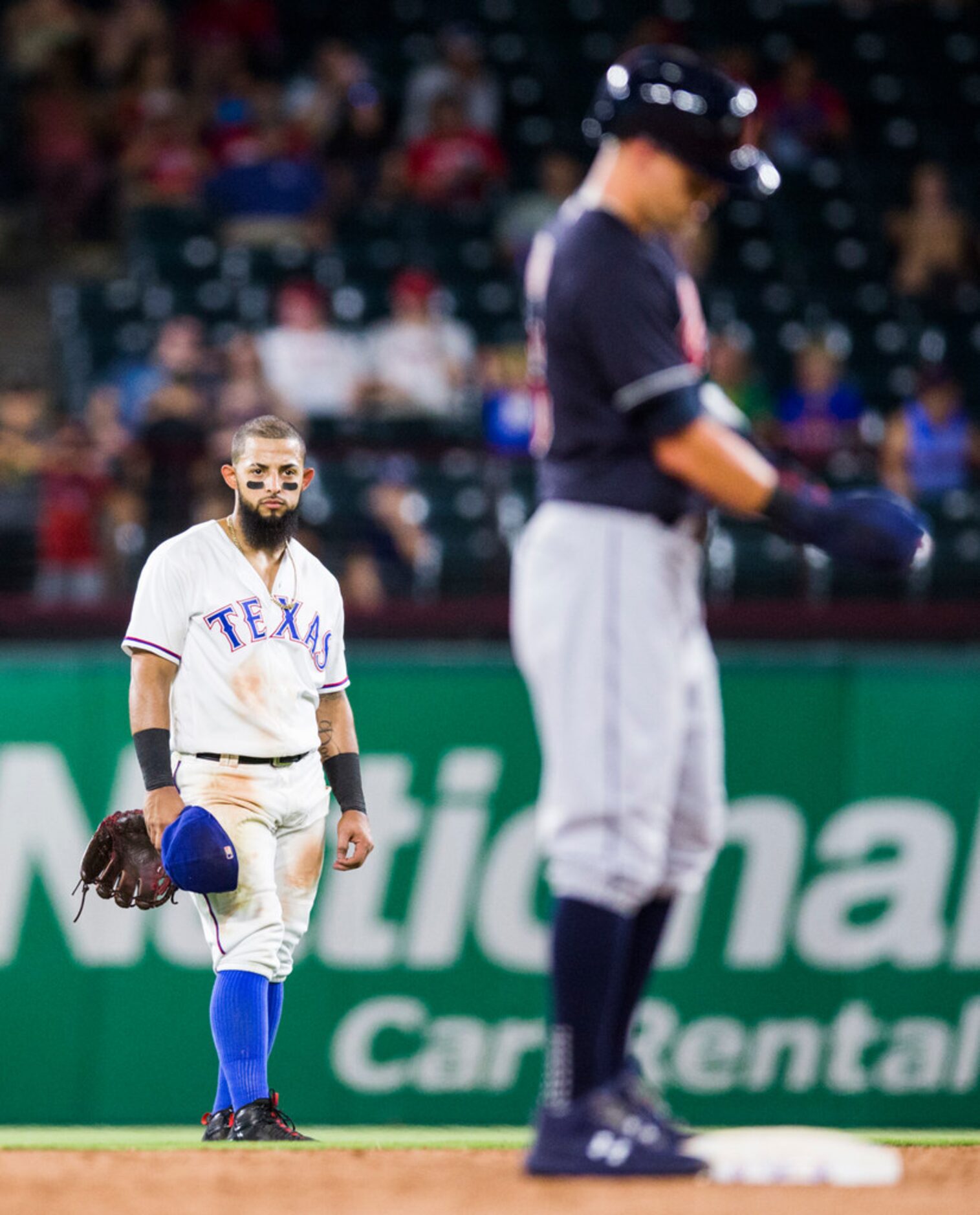 Texas Rangers second baseman Rougned Odor (12) gives a look to a Cleveland Indians player on...