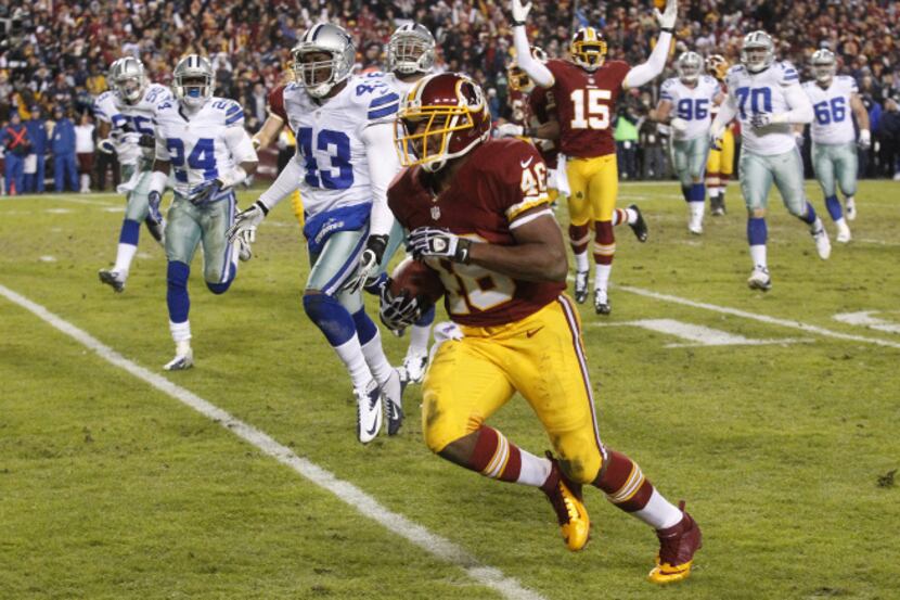 Washington Redskins running back Alfred Morris (46) runs in the end zone for a touchdown in...
