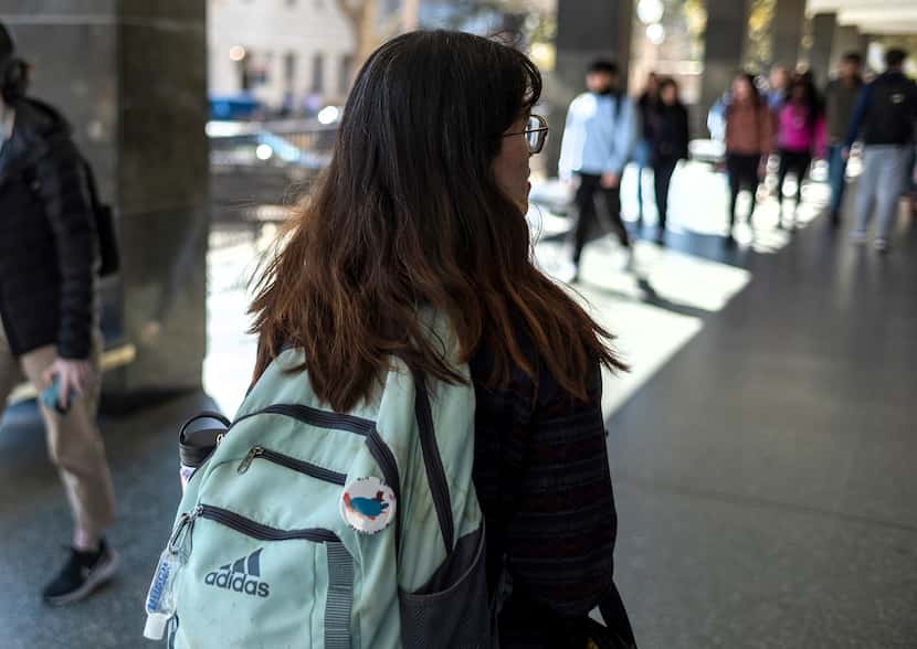 University of Texas at Austin student, Lupe, walks to class while on the campus on Tuesday,...
