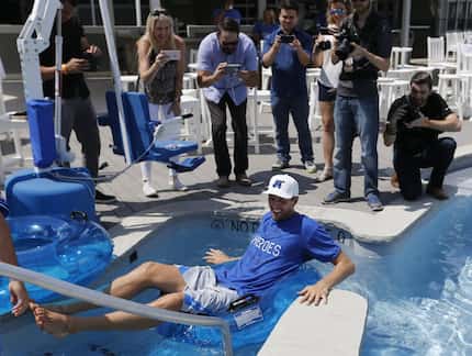  Dirk Nowitzki is the first official fan to ride through the Choctaw Lazy River at Dr Pepper...