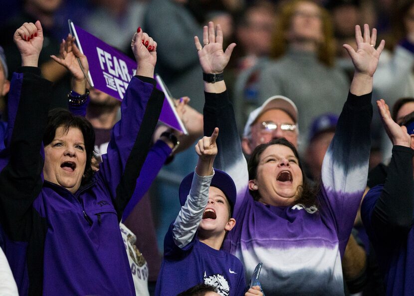 TCU Horned Frogs fans cheer during the second quarter of the Valero Alamo Bowl between TCU...