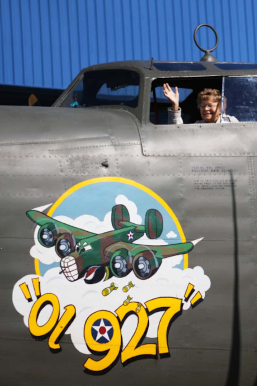 Betty Franzen, 89, sits in the cockpit of a B-24 bomber. Grandson John Jestis paid for the...