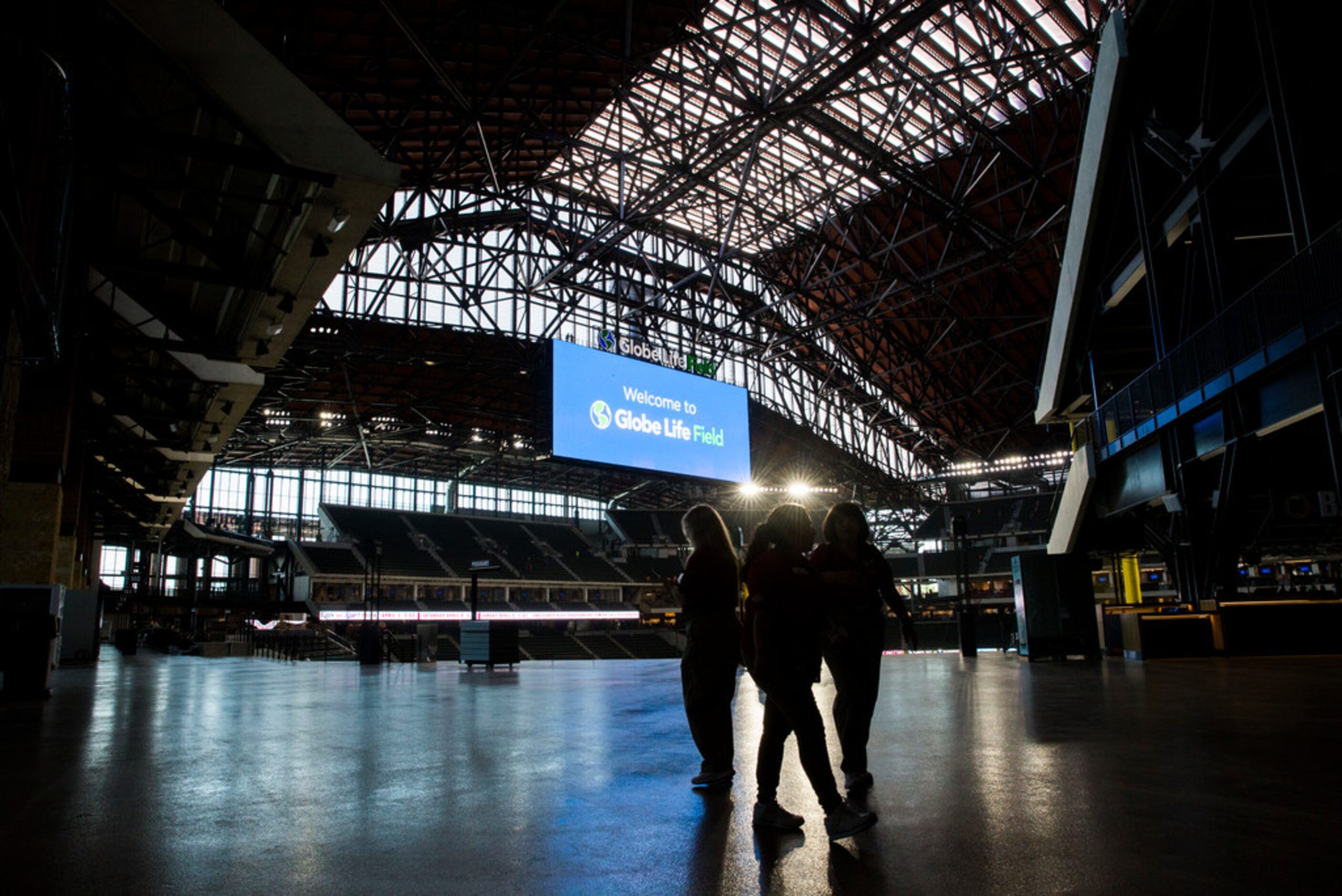 Spectators walk the upper concourse during an open house for the Texas Rangers' new Globe...