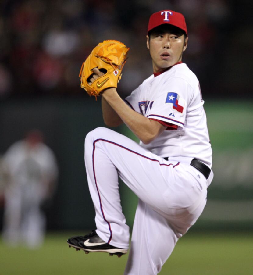Texas Rangers relief pitcher Koji Uehara (19) in the seventh inning of MLB baseball action...