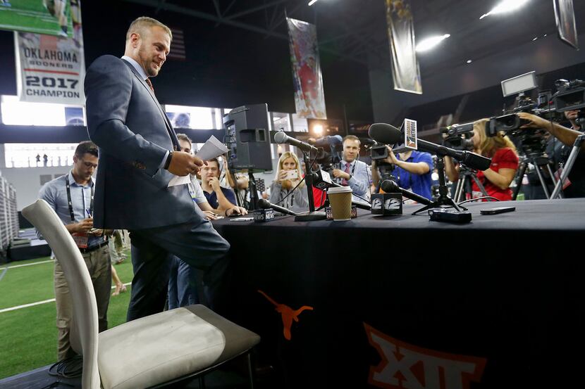 Texas head football coach Tom Herman takes a seat for a breakout session interview with the...