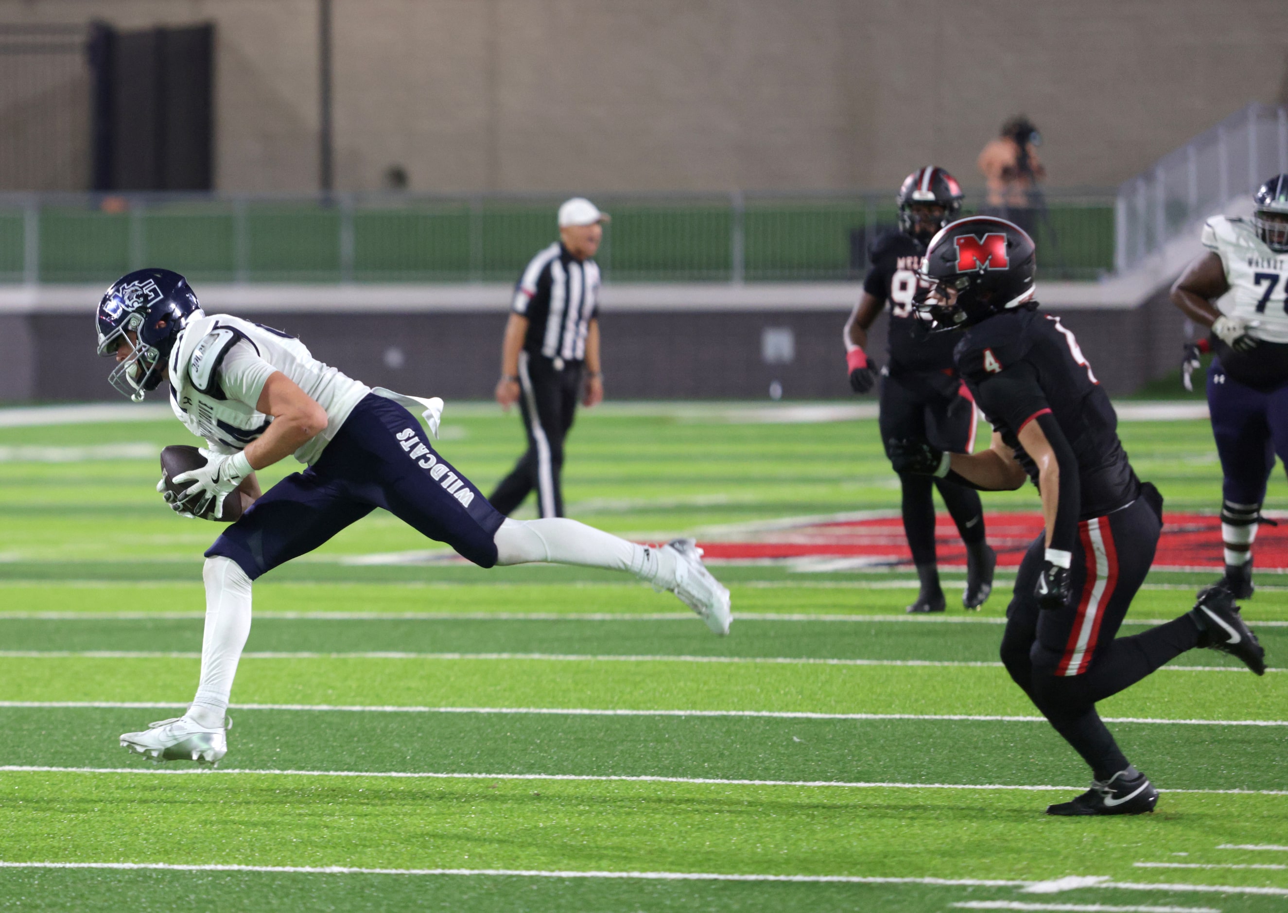 Walnut Grove player #84 Hayden Cooley runs the ball during the Prosper Walnut Grove High...