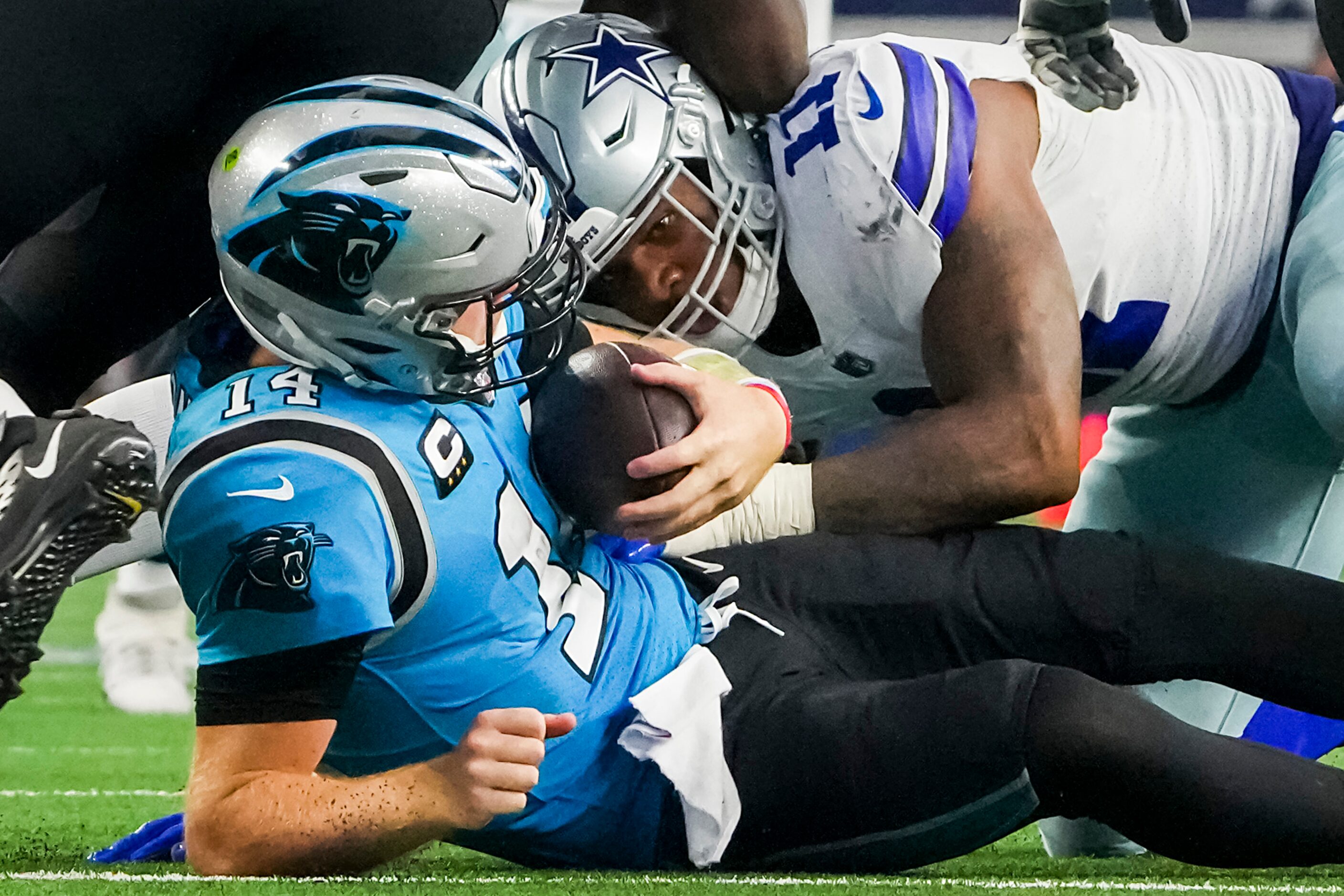 Dallas Cowboys linebacker Micah Parsons (11) sacks Carolina Panthers quarterback Sam Darnold...