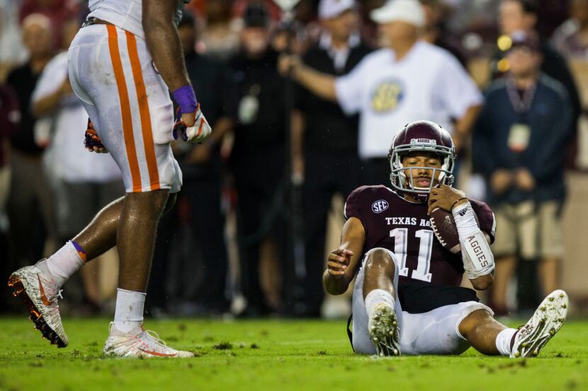 Texas A&M Aggies quarterback Kellen Mond (11) reacts to being sacked during the second...