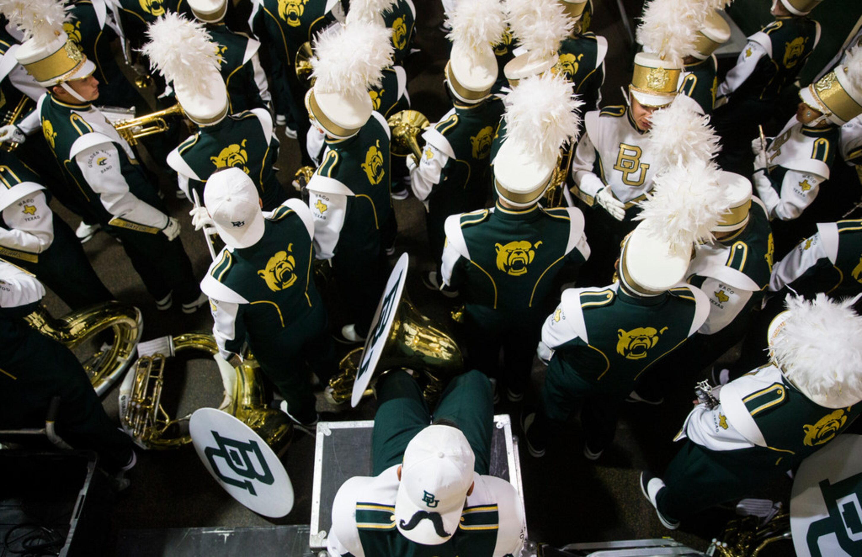 Members of the Baylor Bears band wait in the tunnel before an NCAA football game between...