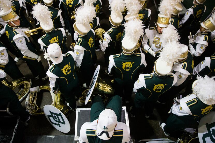 Members of the Baylor Bears band wait in the tunnel before an NCAA football game between...