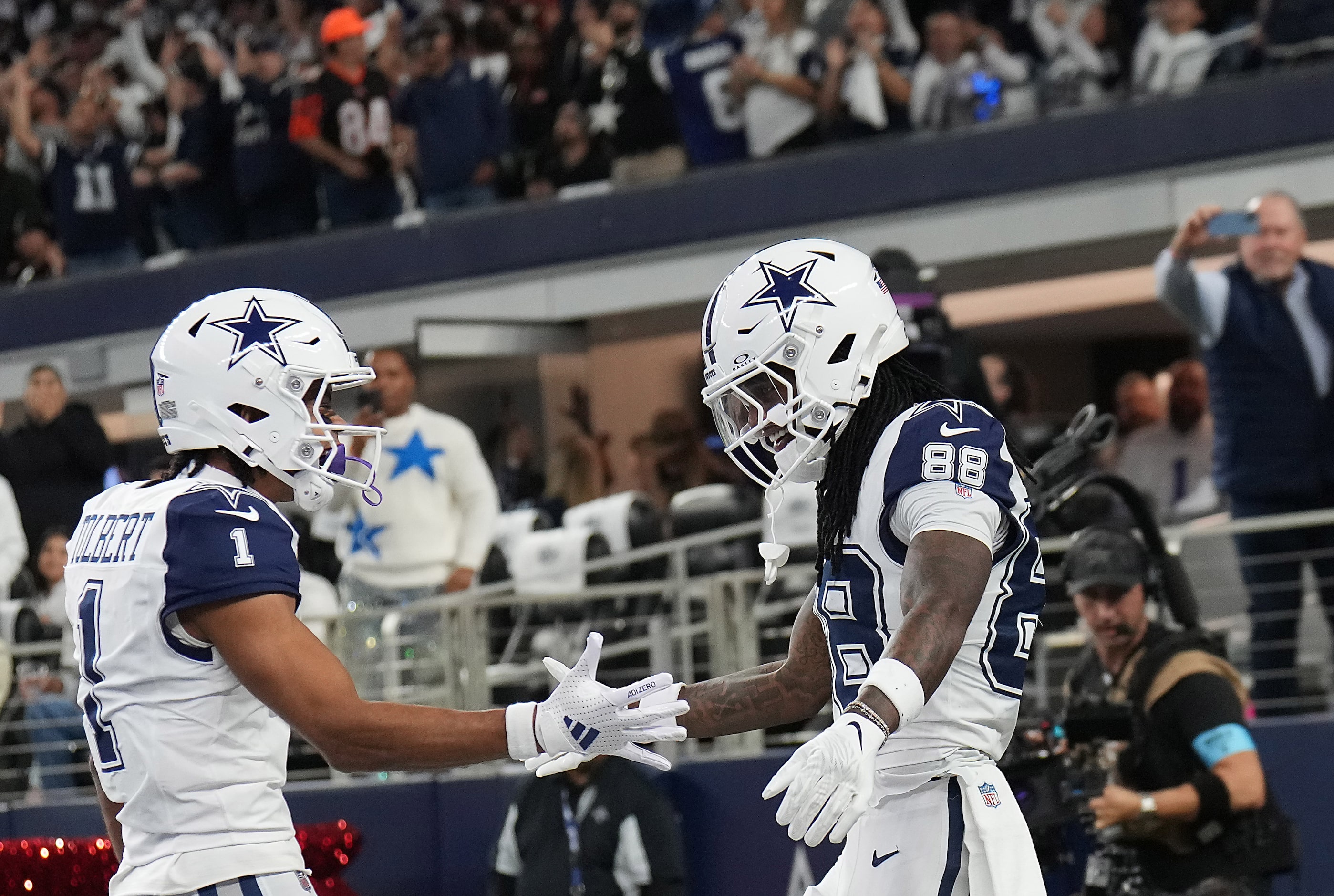 Dallas Cowboys wide receiver CeeDee Lamb (88) celebrates a touchdown reception with wide...