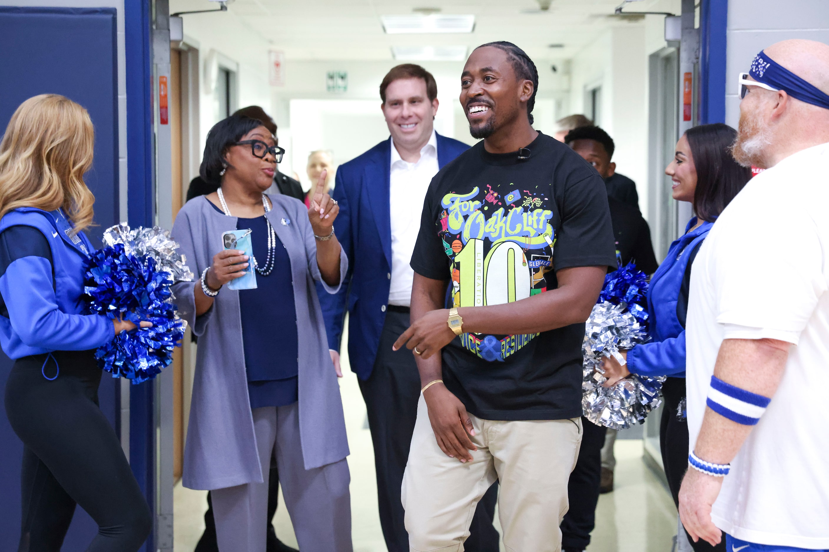 For Oak Cliff founder Taylor Toynes (front) leads Dallas Mavericks CEO Cynthia Marshall...