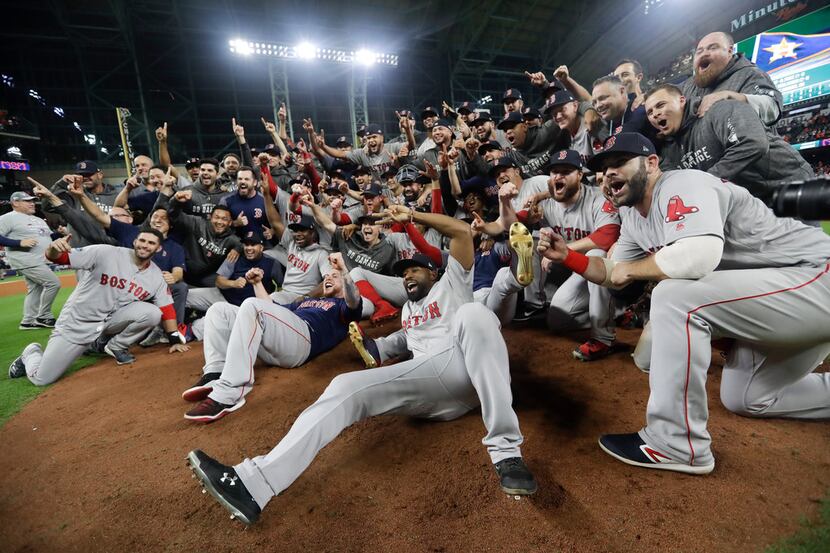The Boston Red Sox pose for a picture after winning the American League Championship Series...