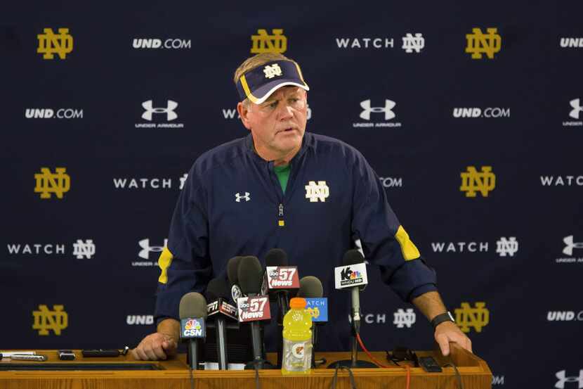 Notre Dame football coach Brian Kelly speaks during a news conference in South Bend, Ind....