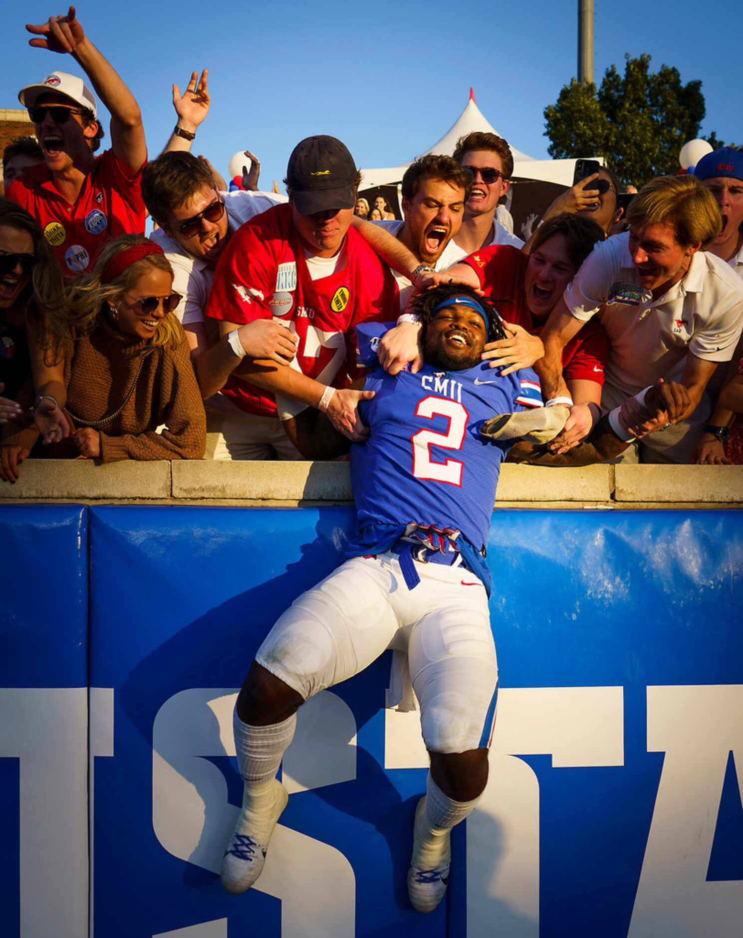 SMU running back Ke'Mon Freeman (2) celebrates with fans after a victory over Temple in an...