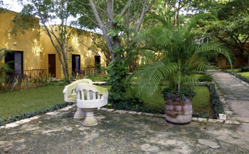 A traditional yucatecan style bench sits in the shade at Hacienda Misné.