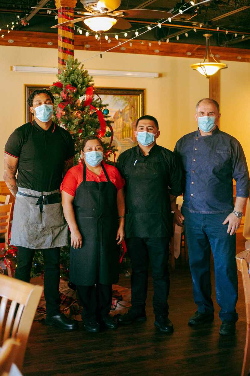 From left, Kyle Underwood, Candida Osilvo, Victor Caradilla, and Aboca's Italian Grill owner...