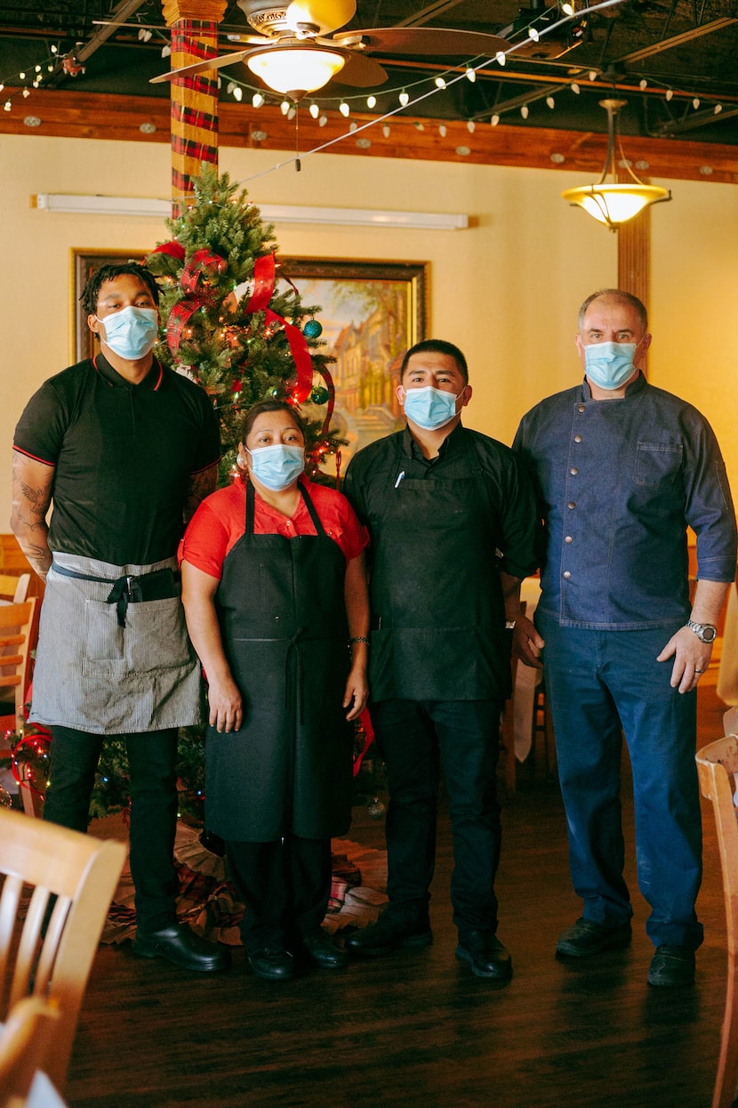 From left, Kyle Underwood, Candida Osilvo, Victor Caradilla, and Aboca's Italian Grill owner...