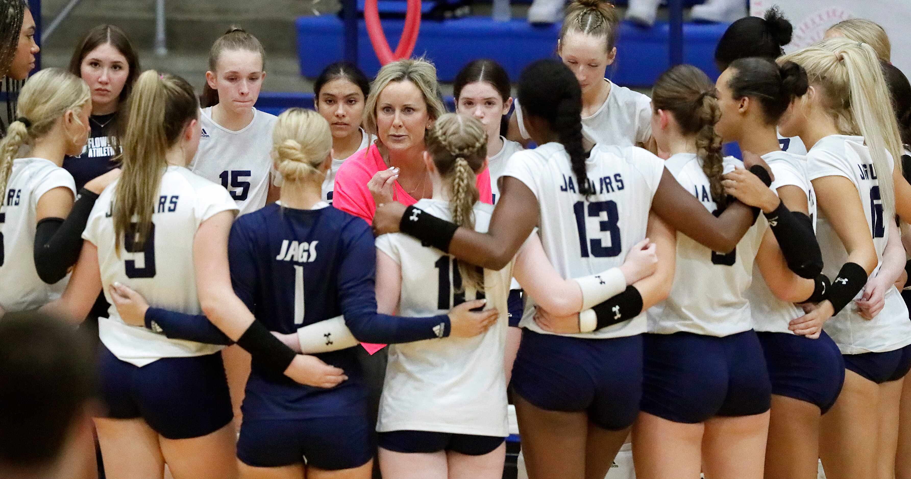 Flower Mound High School head coach Jamie Siegel talked to her team in a time out during...
