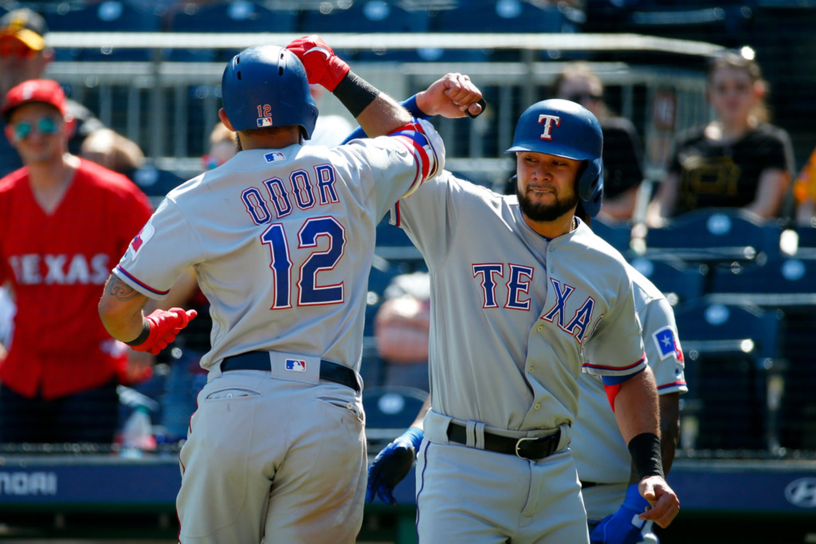 PITTSBURGH, PA - MAY 08:  Rougned Odor #12 of the Texas Rangers celebrates with Isiah...