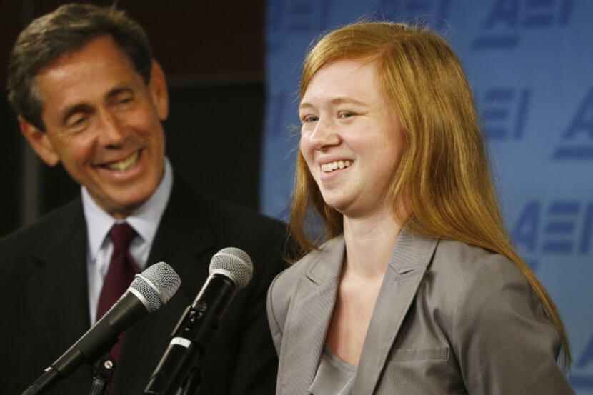 Abigail Fisher, who sued the University of Texas, speaks after the ruling along with Edward...