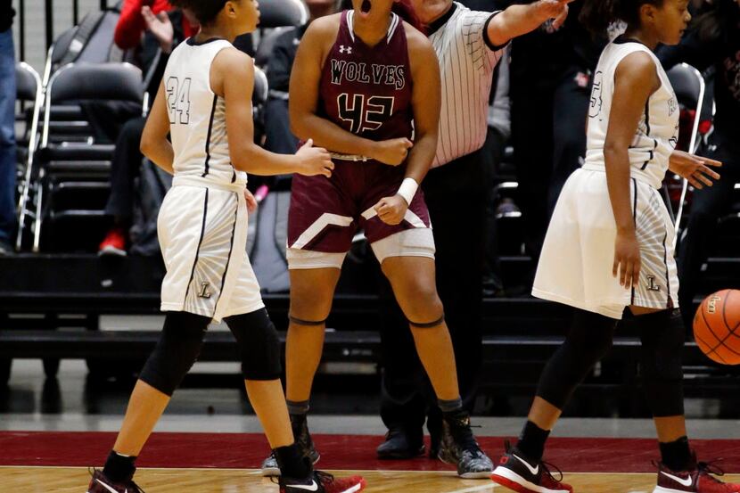 Mansfield Lady Wolves post Lauryn Thompson (43) reacts, after making a clutch play late in...