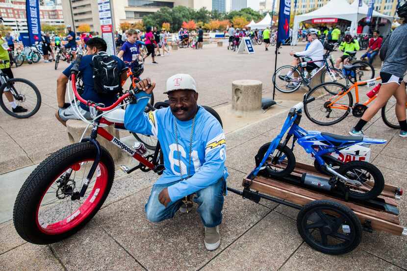Shorty "Bike Man" Crow poses with his bicycle and trailer at the Methodist Dallas Finish...