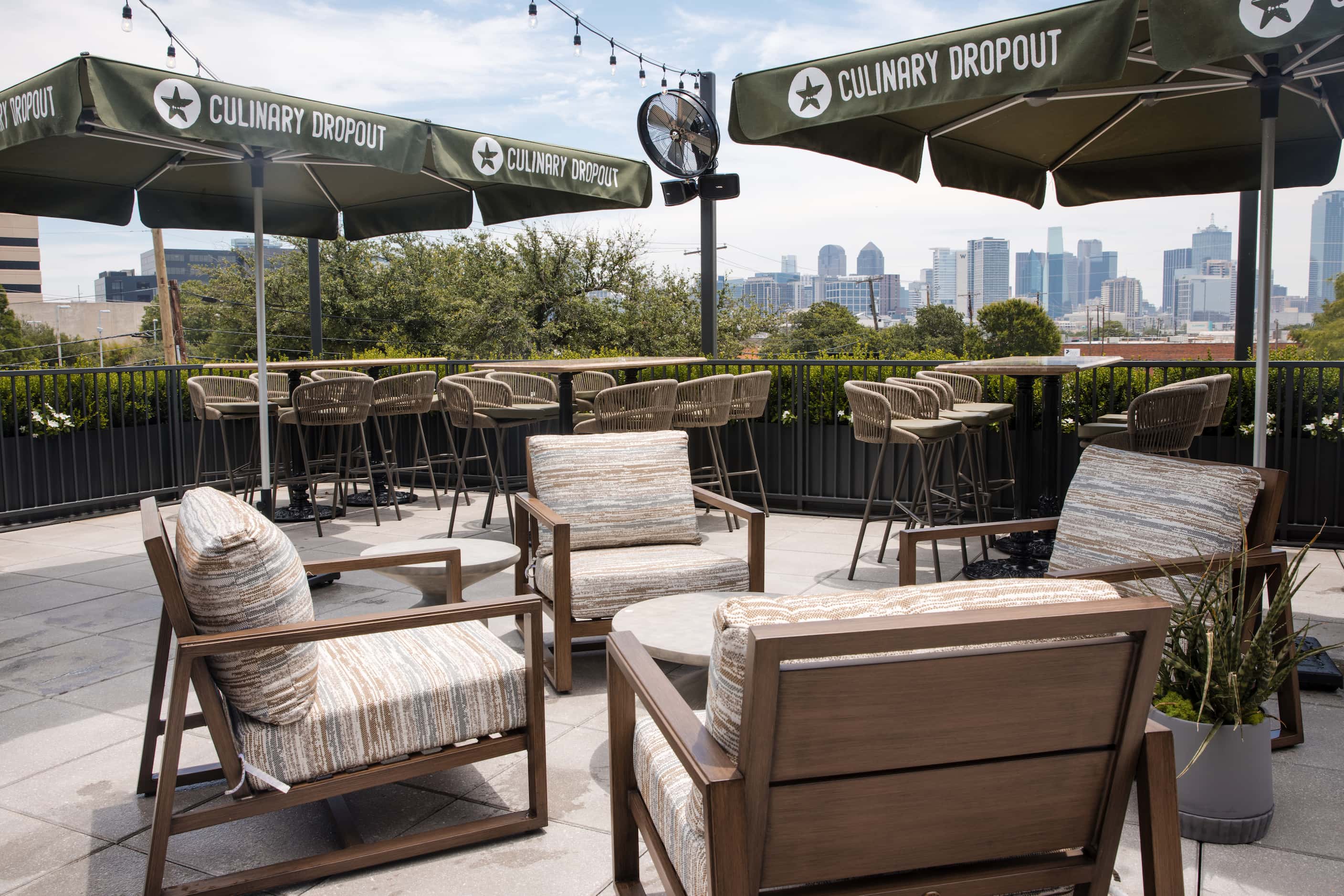 The patio with a look at the Dallas skyone at Culinary Dropout in the design distric in...