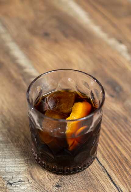 The cold fashioned at Tre Stelle in Far North Dallas is made with bourbon-aged coffee that’s...