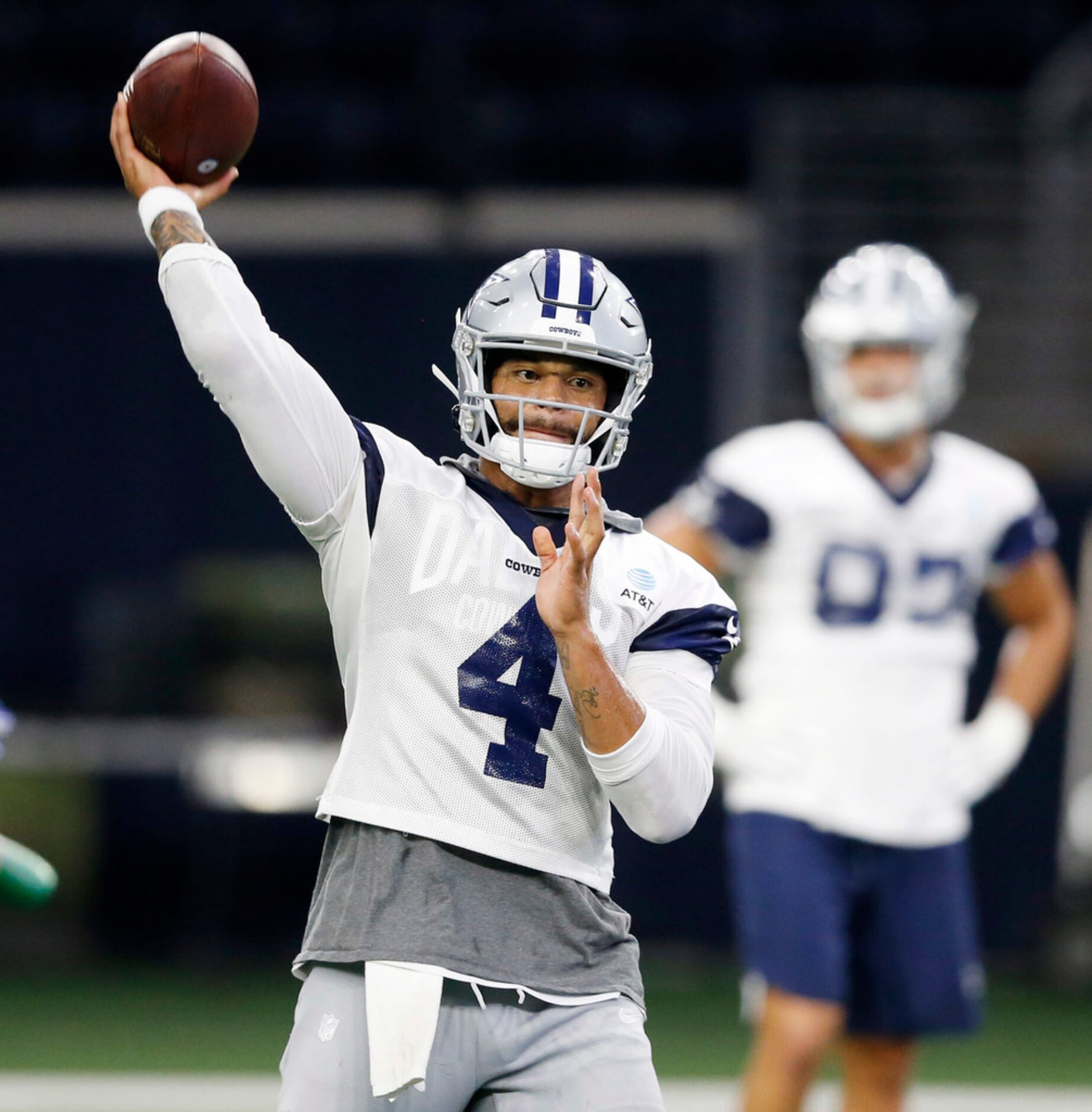 Dallas Cowboys quarterback Dak Prescott (4) attempts a pass during practice at The Star in...