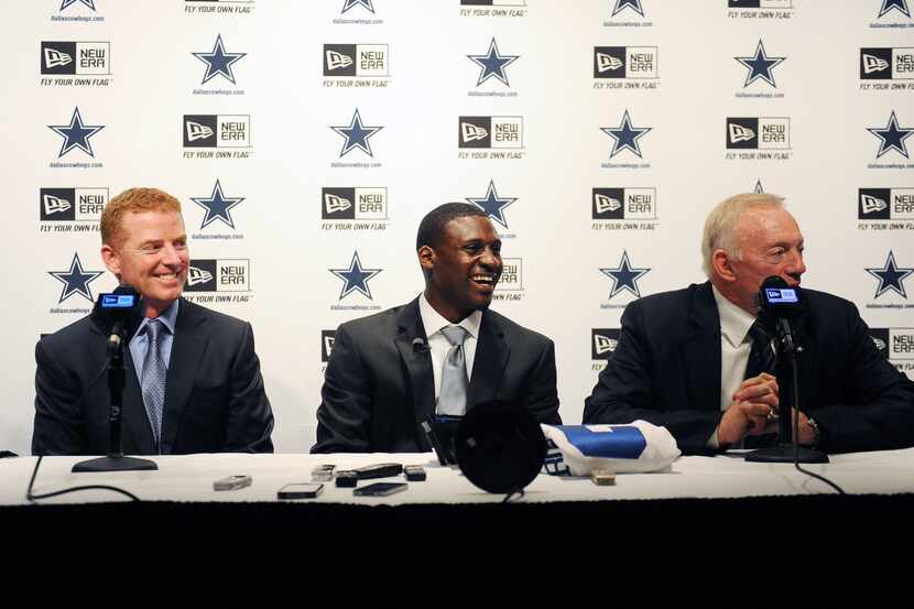 Cowboys coach Jason Garrett (left) and owner Jerry Jones (right) and first-round draft...