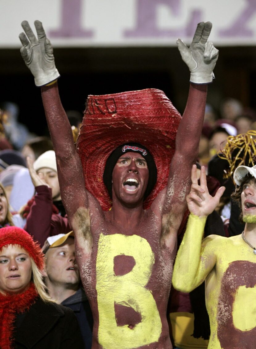 ORG XMIT: *S18BB65B6* Texas State University student Chris Werk, 22, cheers on the Bobcats...