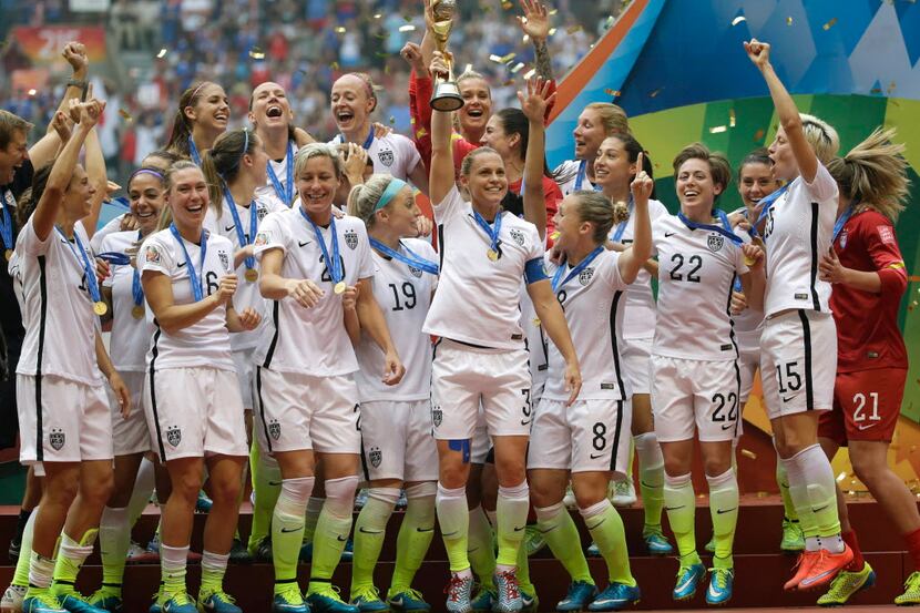 In this Sunday, July 5, 2015 file photo, the United States Women's National Team celebrates...