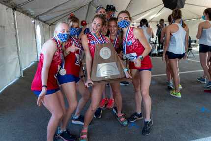Grapevine celebrates their second place in the team competition during the girls UIL Class...
