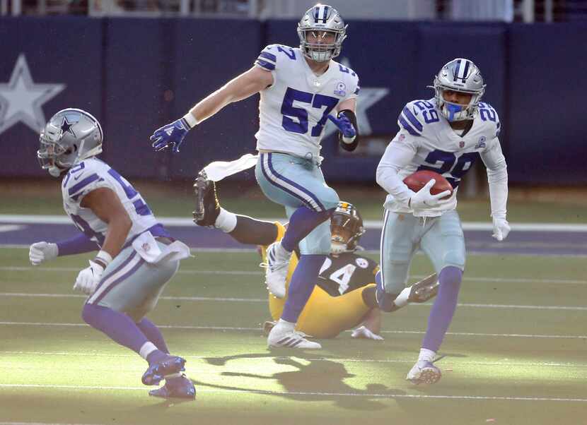 Dallas Cowboys cornerback C.J. Goodwin (29) runs up the field on a kickoff return in a game...