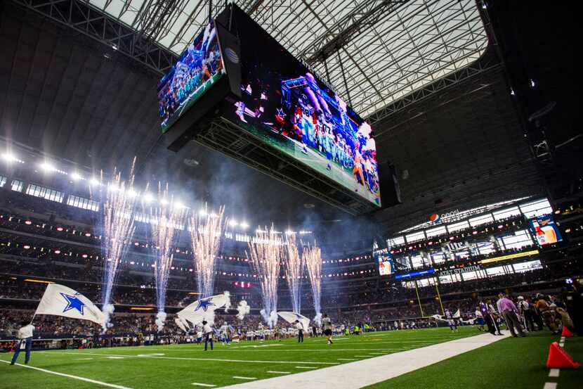 The Dallas Cowboys enter the field before their game against the Minnesota Vikings on...