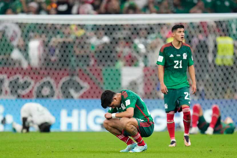 Mexico's Kevin Alvarez retracts after the World Cup group C soccer match between Saudi...