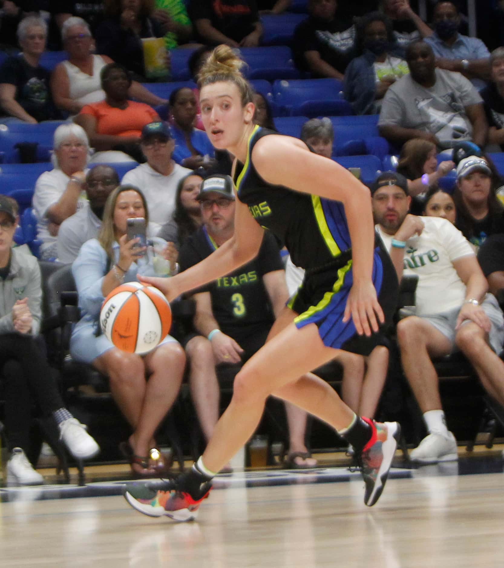 Dallas Wings guard Marina Mabrey (3) looks to set up an offensive play during the first half...