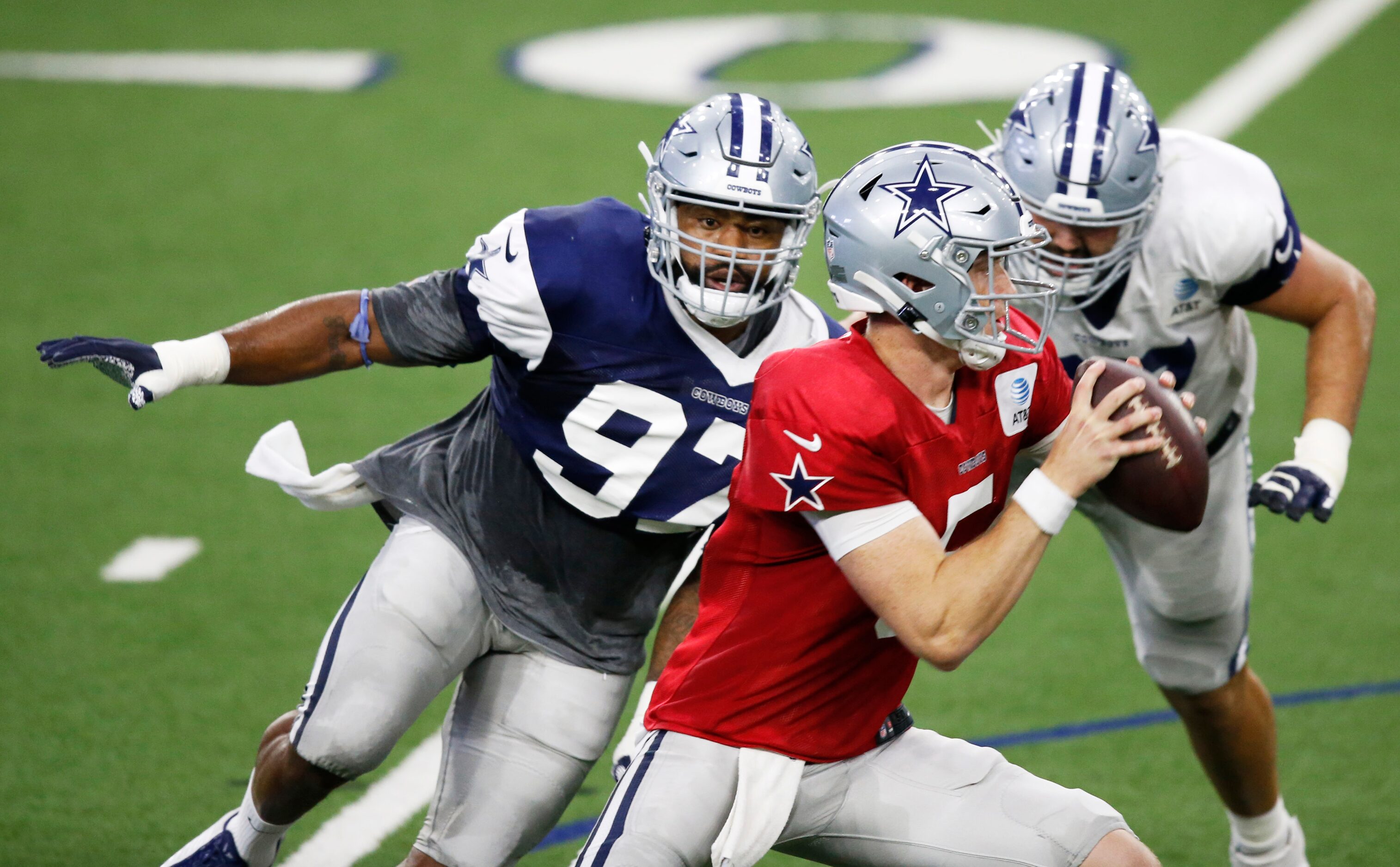 Dallas Cowboys defensive end Everson Griffen (97) rushes after Dallas Cowboys quarterback...