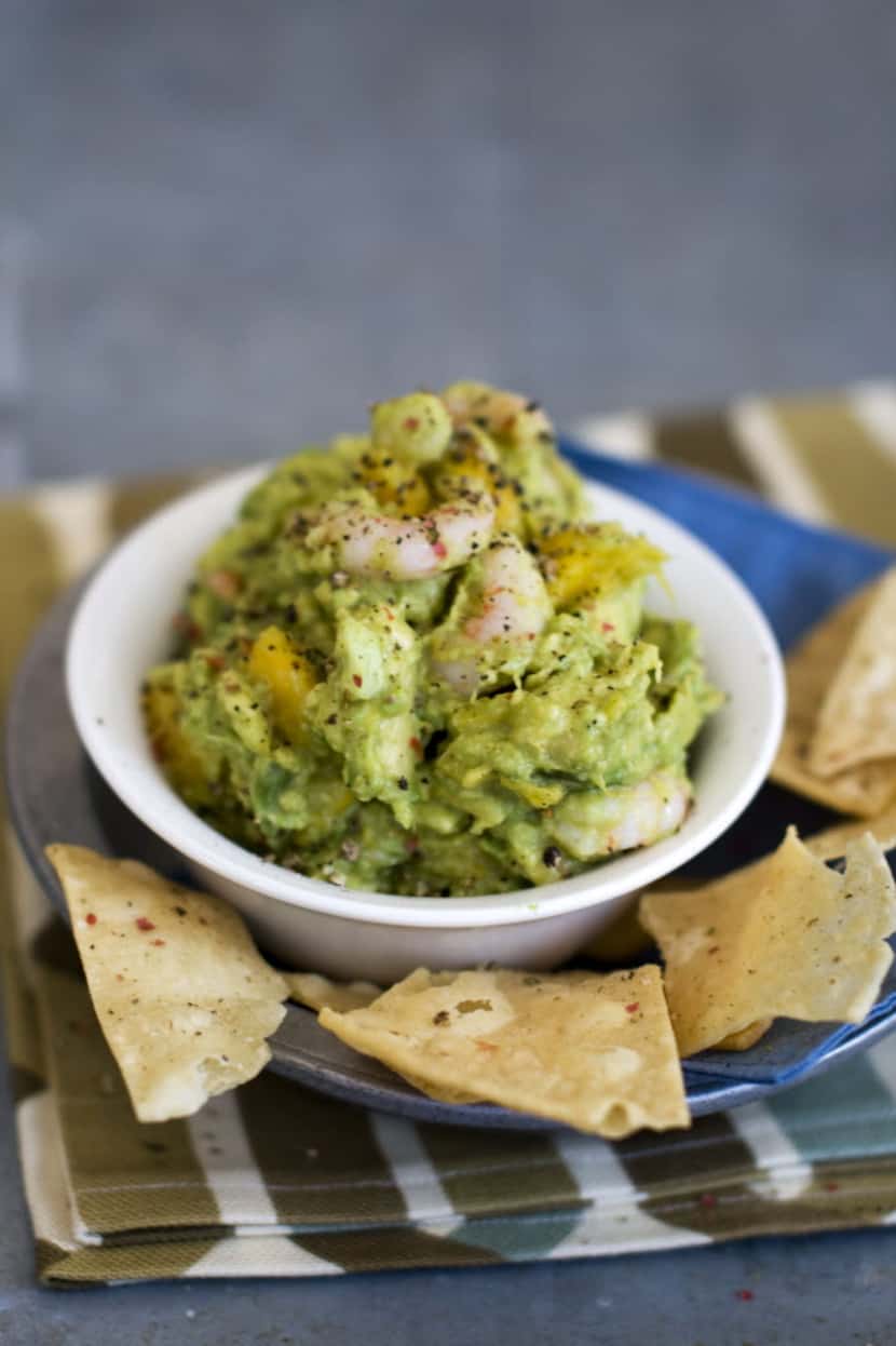Shrimp and mango guacamole is shown served in a bowl in Concord, N.H.